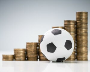 football increasing piles of money