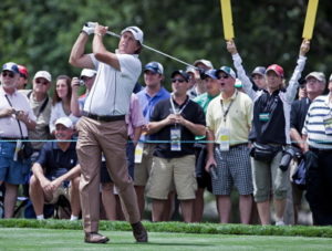 phil mickelson taking a swing at a golf tournament